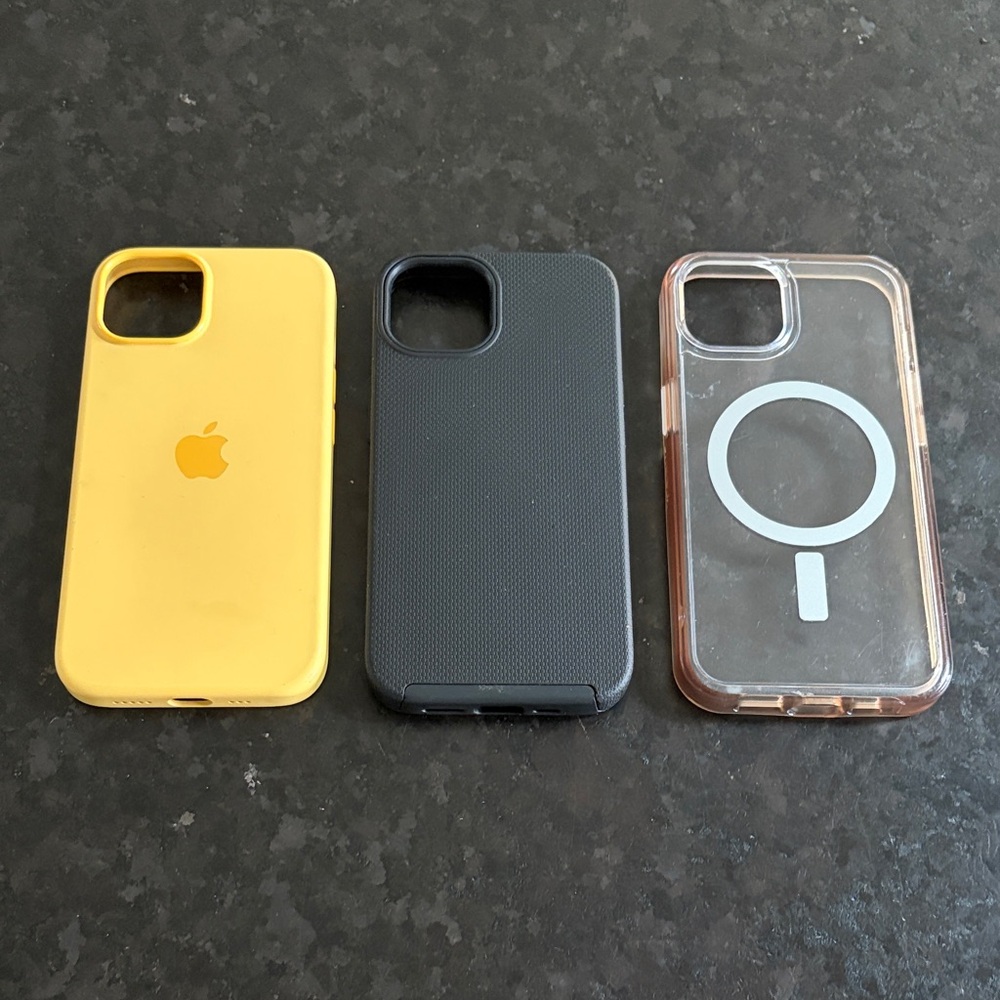 iPhone 14 Case Trio - Yellow Apple Case, Black Generic & Transparent Otterbox.